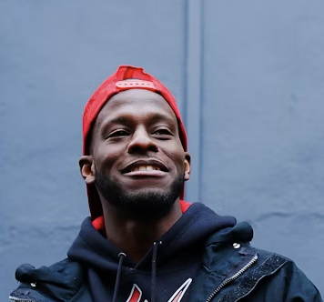 Black man red cap portrait